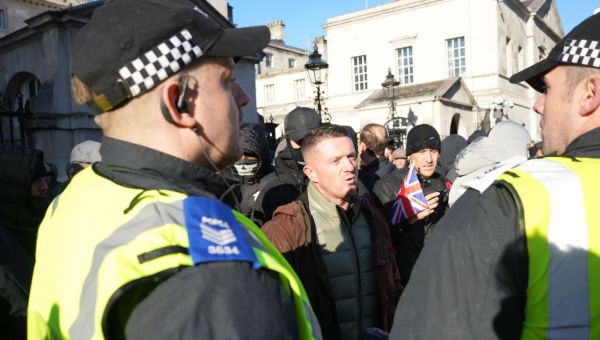 Taxi for Tommy as Robinson leaves before group face police