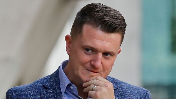Tommy Robinson jailed for 18 months over Syrian refugee contempt of court