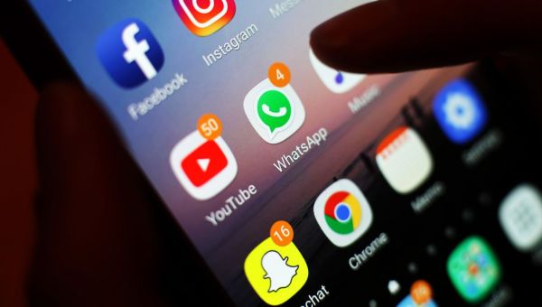 Mobile phones to be banned in schools across England