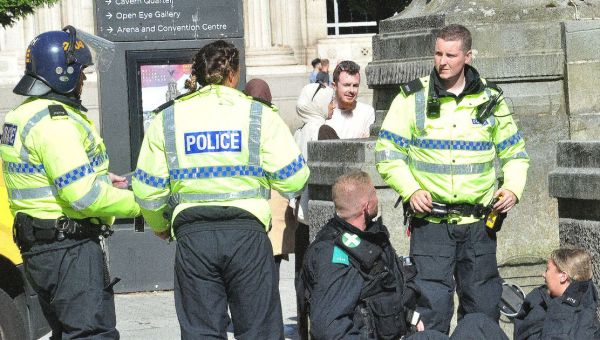 Jeering rioters surround injured young female officer saying ‘she deserves it’