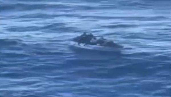 Video Shows Cruise Ship Rescuing Stranded Migrants on Small Boat Off Florida Coast