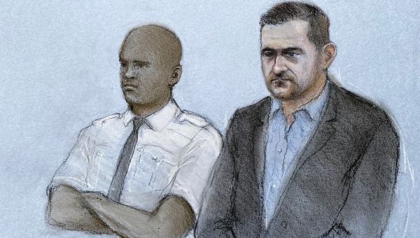 Tommy Robinson jailed for contempt of court over allegations against Syrian refugee