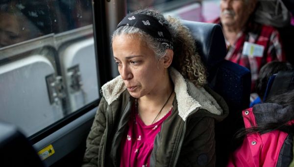 Migrants waiting to cross the border say government’s app for asylum-…