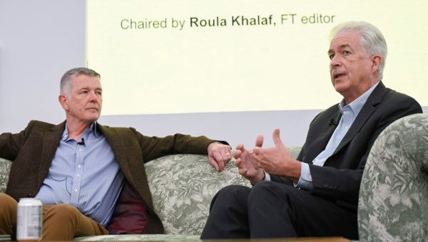 Spy Chiefs of the C.I.A. and MI6 Convene, on a Couch and for a Crowd