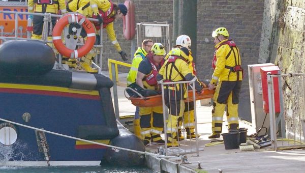 'We're in a boat...water is coming in. We have children. Please help'