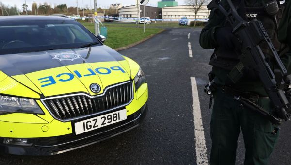 Fear on streets after N. Ireland terror outrage sees cop shot in front of son