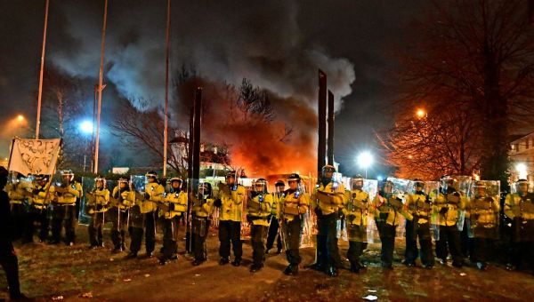 Police van in flames as ‘asylum seeker’ hotel protest descends into chaos