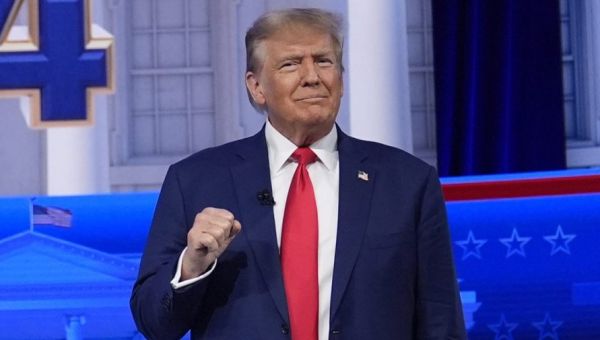 Trump rallies Iowa voters via teleconference amid winter storm: Watch live