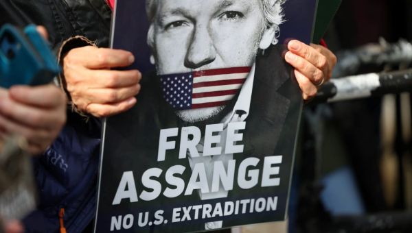 Biden Says He’s ‘Considering’ Request to Drop Julian Assange’s Prosecution