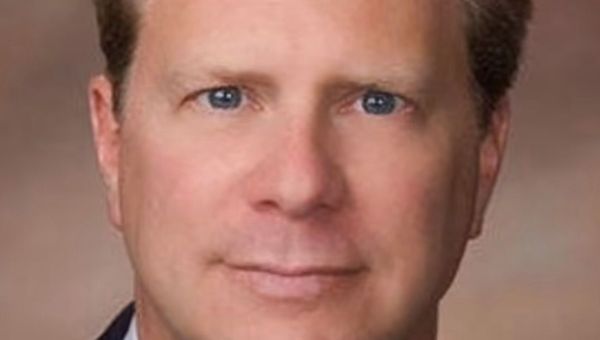 Judge shot dead in his own driveway as mystery gunman goes on the run