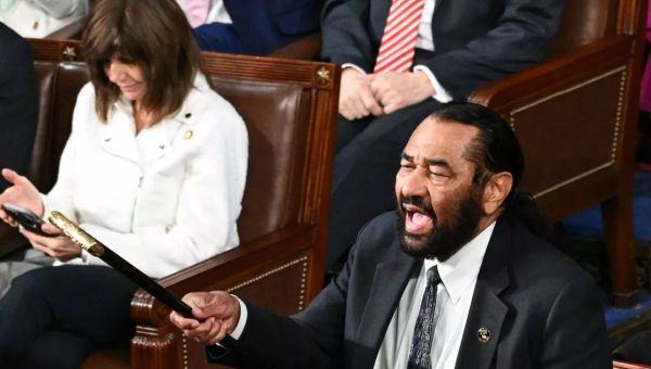 Donald Trump’s first address to Congress descends into chaos as protests erupt