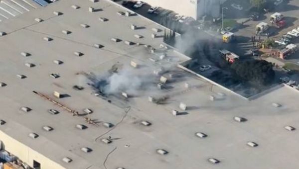 Plane crashes into huge warehouse with ‘casualties’ reported