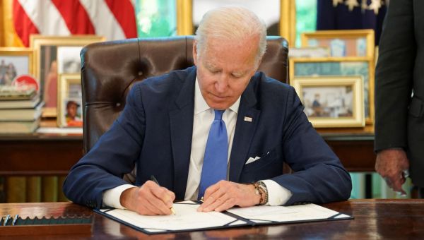 Biden signs bill to protect same-sex and interracial marriages