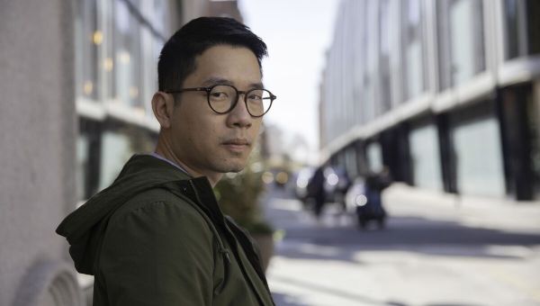 Wanted HK Activist Denies Family Help After Police Question Them