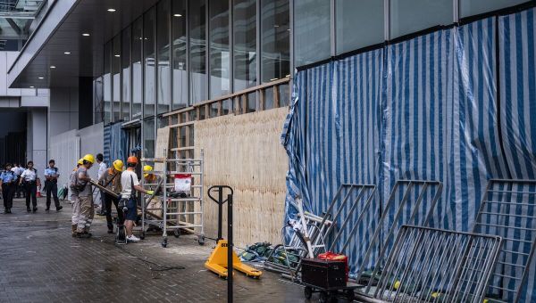Hong Kong Jails 12 for Storming Lawmakers' Building, Reports Say