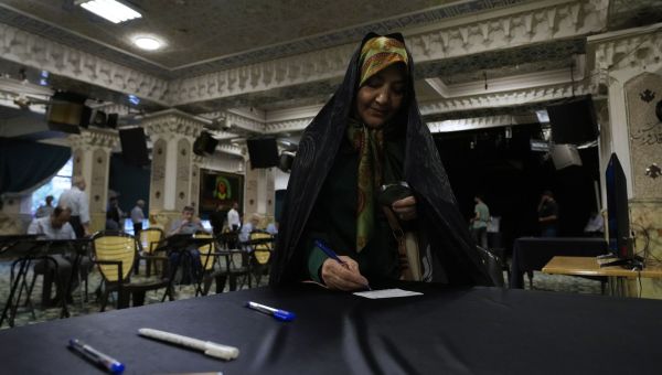 Iran’s presidential elections head to a run-off amid escalating Mideast war