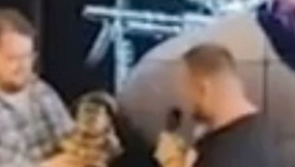 Moment pro-Putin blogger is handed bomb disguised as statuette that killed him