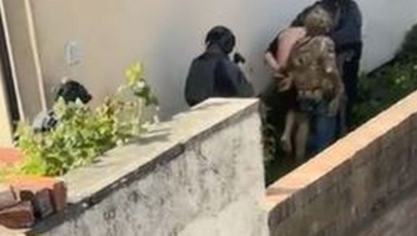 Moment man is marched outside in underwear after police raid home in terror plot probe – Manchester Evening News