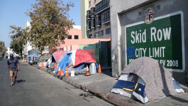 Newsom urges California cities and counties to ban homeless encampments