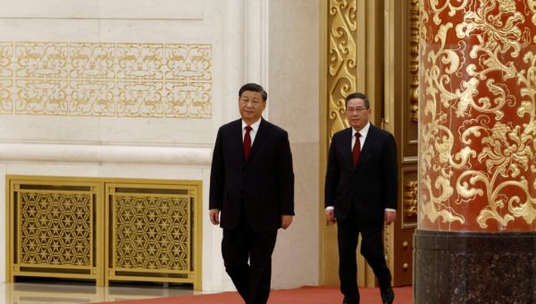 China’s Xi expands power as head of ruling party, promotes allies to inner circle