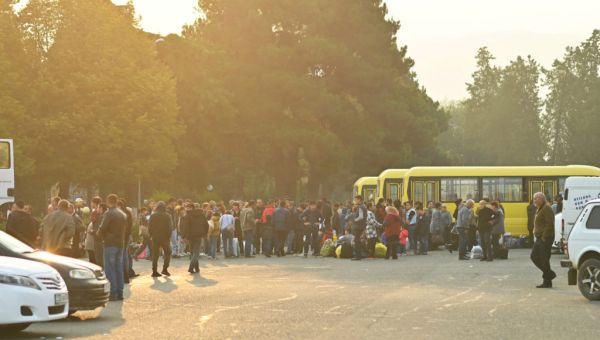 Thousands of Armenians flee Nagorno-Karabakh after Azerbaijani military reclaims control