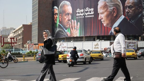 Locked in conflict and hammered by sanctions, Iran wary over U.S. election result