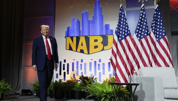 Trump suggests Harris misled voters about her race
