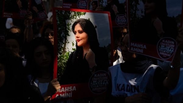 Mahsa Amini did not die from blows to body, Iranian coroner says amid widespread protests