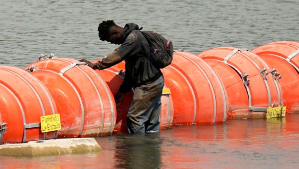 Judge orders Texas to remove floating barrier in Rio Grande designed to deter migrants