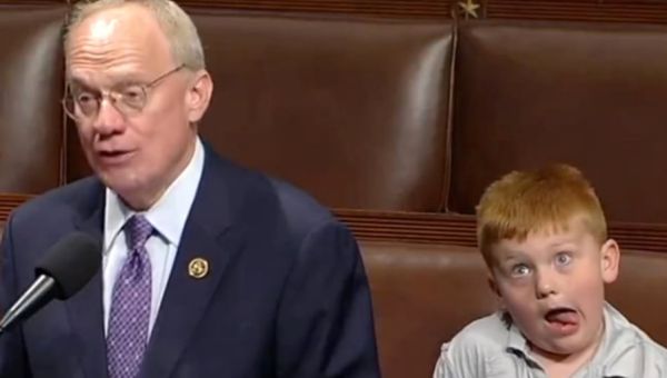 Congressman’s son steals the spotlight while his dad delivers remarks at the Capitol