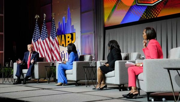 In a testy exchange at a convention for Black journalists, former President Donald Trump falsely questioned Vice President Kamala Harris’ racial identity. We fact-checked his claims about migrants and Black American life.