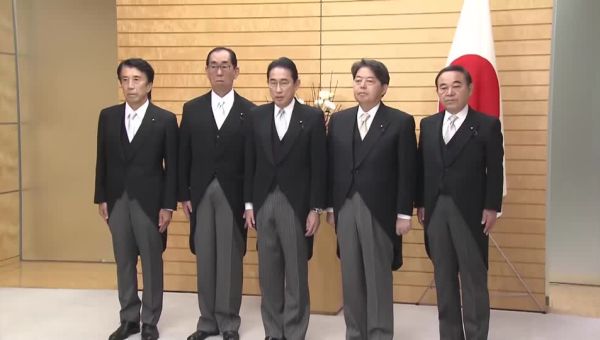 Japan PM purges cabinet after financial scandal