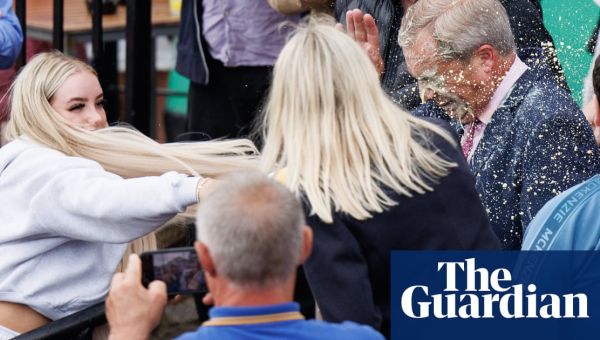 Woman who threw milkshake over Nigel Farage admits assault