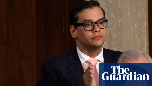 Democrat attacks McCarthy as Santos aide charged with impersonating his chief of staff