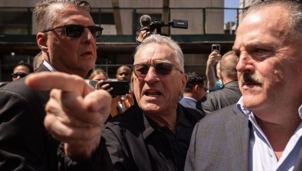 Trump is a ‘clown’ who will become ‘dictator for life’, says De Niro outside court