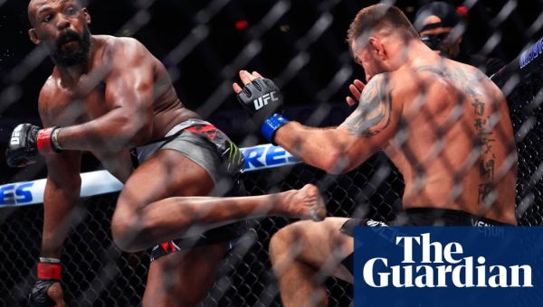 Jon Jones knocks out Stipe Miocic to retain UFC title as Trump looks on