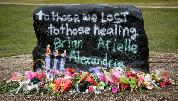 Pro-gun message on MSU’s Rock painted over to honor students killed