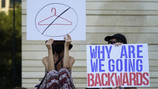 Kate Cox is leaving Texas to get an abortion. New data shows she’s part of post-Roe travel uptick.
