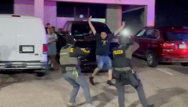 300 federal agents arrest 100 undocumented immigrants in 'underground nightclub' raid