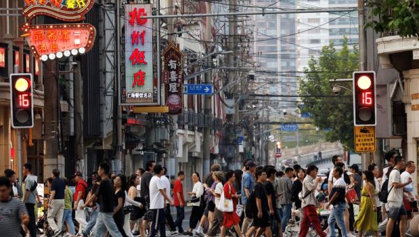 China vows to ramp up policy stimulus to spur growth in 2025