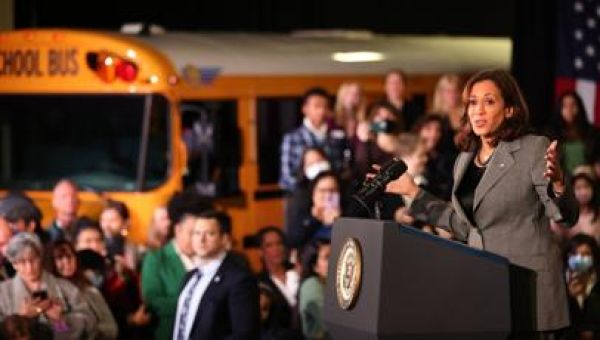 Vice President Kamala Harris, in Seattle, touts electric school buses, infrastructure bill