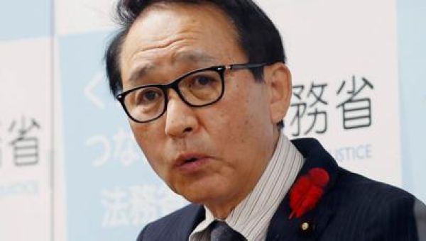 Japan minister quits over execution remark, PM delays trip