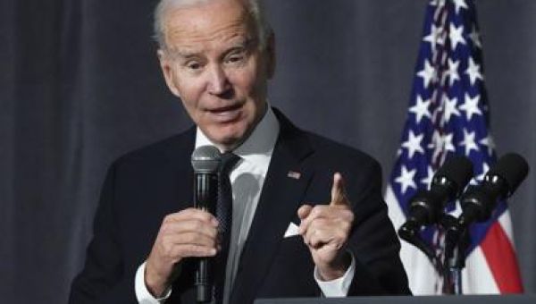 Biden tours beach town damaged by massive California storms