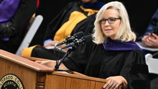 Colorado College alum Liz Cheney delivers commencement speech; graduates turn chairs away from stage in protest