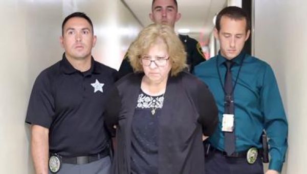 After years of threats, a feud ends with a Black mom dead and her white neighbor arrested