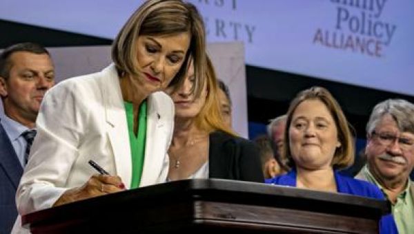 Judge blocks enforcement of Iowa abortion ban days after signed into law
