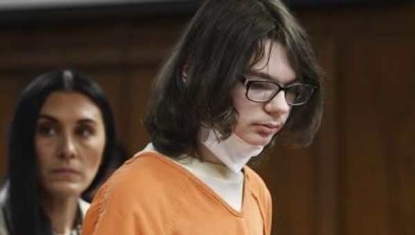 A staffer recalls chaos and wound at key sentencing hearing for a Michigan school shooter