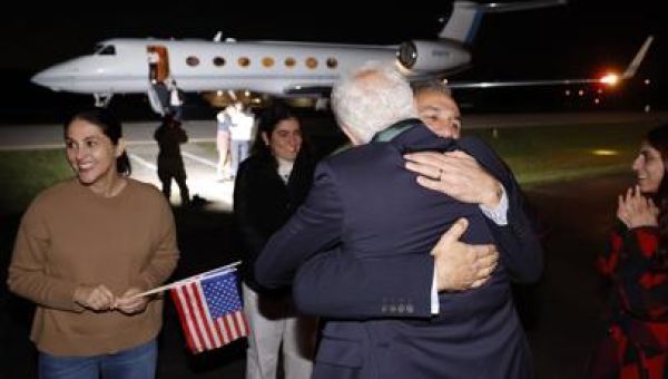 Americans released by Iran arrive back in US, tearfully embrace loved ones after controversial deal