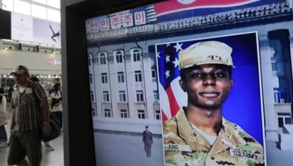 Army private who fled to North Korea charged with desertion, held by US military, officials tells AP