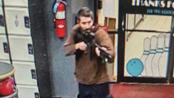 Police surround home in search for suspect in the fatal shooting of 18 in Maine